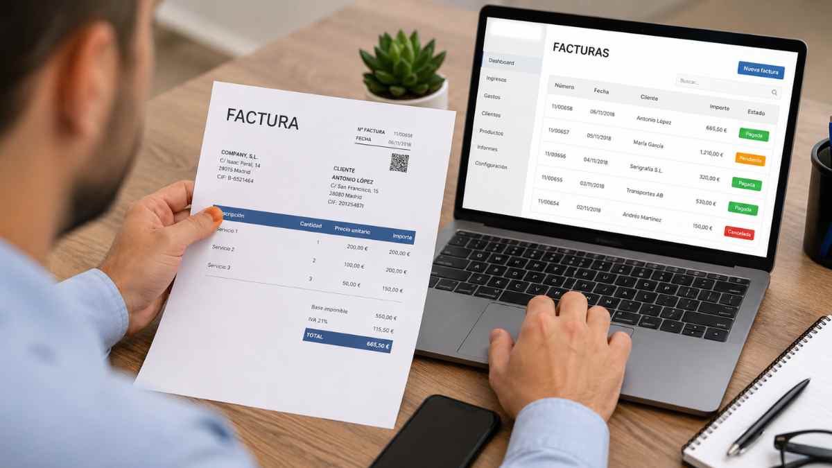 Autónomo revisando una factura electrónica en ordenador portátil con software de facturación adaptado a Verifactu