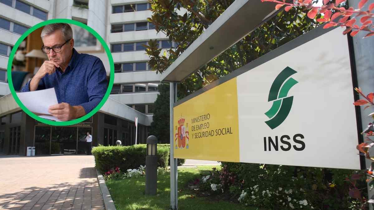 Hombre revisando documentos sobre jubilación anticipada a los 61 años frente a oficina del INSS Seguridad Social