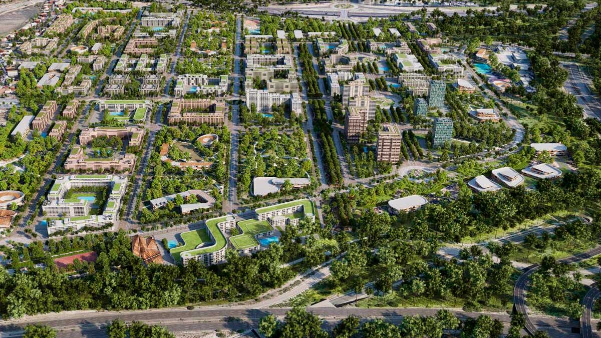 Vista aérea del futuro Barrio de Los Cerros en Madrid con zonas verdes y edificios residenciales